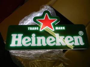 lot 43 image: HEINEKEN LED LIGHT  - APPROX 21 BY 12 - (WORKS AS SEEN IN PICTURES WILL NEED A NEW CORD) - SEE PICTURES