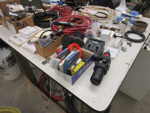 lot 170 image: PARTS AND ACCESSORIES FOR DRY CLEANING MACHINES WITH TABLE