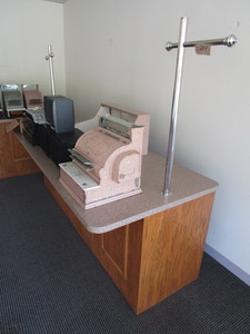 lot 204 image: FRONT COUNTER, OAK, WITH LAMINATE TOP AND CLOTHES HANGING COMPONENT