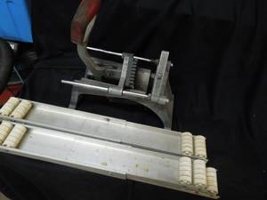 lot 45 image: Vintage French Fry Cutter and Appliance Rollers