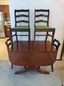 lot 69 image: Vintage Table with Four Chairs