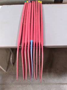 lot 23 image: (8) Plastic Red Hockey Sticks See ...
