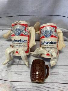 lot 47 image: Blatz Mug & 2 Budweiser Inflatables