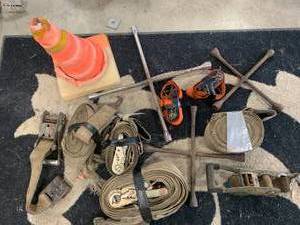 lot 84 image: Lot of Tie Down Straps, Tire Irons, Cone