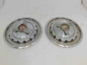 lot 86 image: Vintage 1957 Chevrolet Spinner Hubcaps (2)