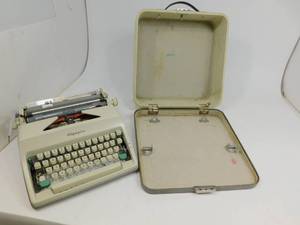 lot 48 image: Vintage Olympia Typewriter with Original Case