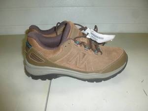 lot 53 image: New Balance Walker Shoes Size 10