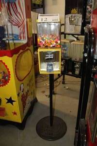 lot 12 image: Curtis Bulk Candy Dispenser Single-Head Stand $.25