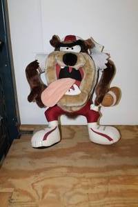 lot 77 image: Warner Bros. Looney Tunes Taz Tazmanian Devil Football Player Stuffed Animal