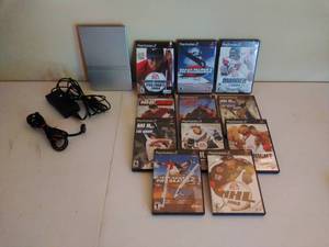 lot 43 image: PlayStation 2 with Games