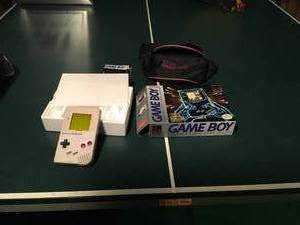 lot 252 image: Gameboy Color with Box, Instructions and Nintendo Fanny Pack