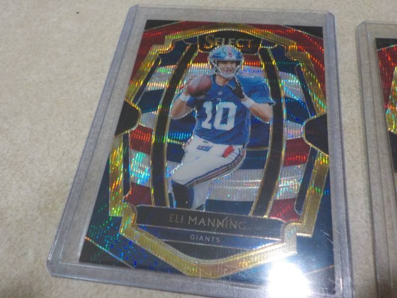 lot 99 image: Peyton and Eli Manning Cards... . End of K