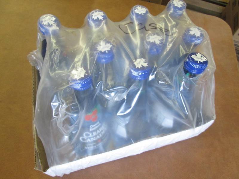 lot 63 image: 10- 11 oz bottles Clearly Canadian ... A1