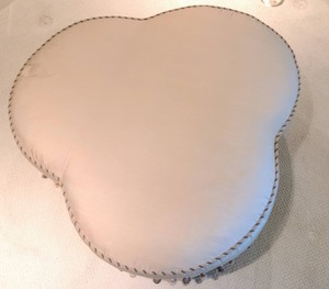 lot 6 image: Large BeigeTaupe Ottoman With Tassel Accents