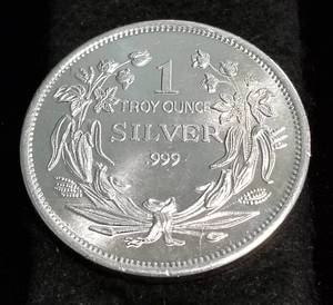 1 TROY OZ. .999 FINE SILVER SEATED DOLLAR DESIGN