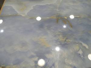 lot 69 image: Lumina Caspian Onyx 24x48 Polished Porcelain Tile LOT OF 5 TILES.