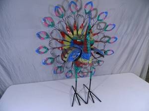 lot 17 image: New Large Recycled Metal Garden Art Spinning Peacock