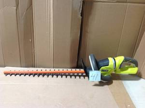 lot 41 image: RYOBI 24 in. 40-Volt Lithium-Ion Cordless Battery Hedge Trimmer (Tool Only) &nbspin good condition