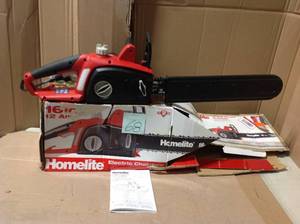 lot 68 image: HOMELITE 16 in. 12 Amp Electric Chainsaw &nbspin good condition