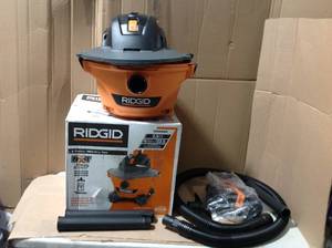 lot 85 image: RIDGID 6 Gal. 3.5-Peak HP NXT WetDry Shop Vacuum with Filter, Hose, Wands, Utility Nozzle, Crevice Tool &nbspin good condition