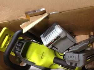 lot 105 image: Sun Joe 16 in. 40-Volt Electric Cordless Chainsaw Kit with 4.0 Ah Battery  Charger in good conditions