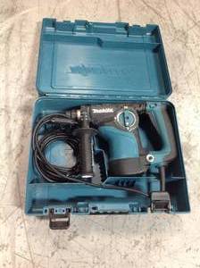 lot 112 image: Makita 7 Amp 1-18 in. Corded SDS-Plus ConcreteMasonry Rotary Hammer Drill with Side Handle and Hard Case Model#  HR2811F in working conditions