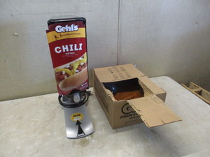 lot 7 image: Gehls 2.0 Sauce Dispenser with 3 Unopened Bags of Chili Sauce (Good Lot Code).