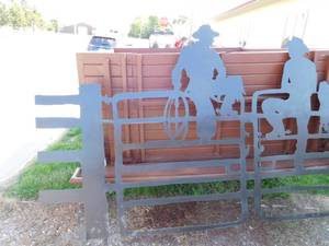 lot 11 image: Metal cowboy fence