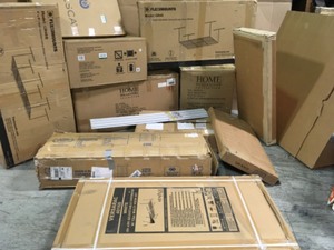 lot 27 image: PALLET WITH GARAGE RACKS AND OTHER CABINETS CUSTOMER RETURNS SEE PICS
