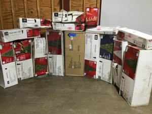 lot 46 image: Pallet with assorted Christmas Trees various sizes open box