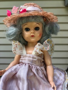 lot 168 image: 1950s Virga Doll with extra Gigi Outfits