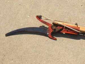 lot 64 image: 10 Foot Wooden Handled Tree Trimmer