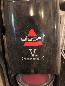 lot 93 image: Two Shark Vacuums and One Bissell Versus Vacuum