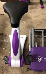 lot 56 image: Smooth Fitness Stationary Bike and a Pilates Pro Chair