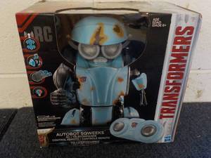 lot 25 image: Transformers Auto Bot Sqweeks...