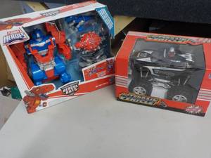 lot 36 image: Playskool Heroes and All Terrain Ve...