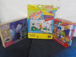 lot 42 image: Puzzles, Pop Up Books and Cra-z-Fun...