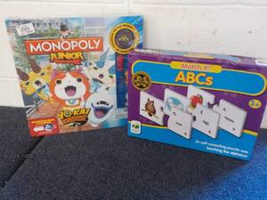 lot 61 image: Monopoly Jr and ABCs Match It Game...