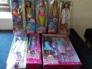 lot 100 image: Barbie and Ken Lot...