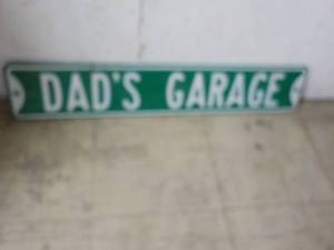 lot 55 image: Metal Sign Dads Garage 32 x 6...