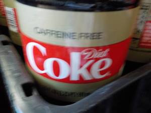 lot 128 image: Case of 24 Bottles Caffeine Free Di...