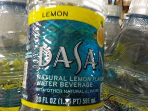 lot 130 image: Case of 24 Bottles Dasani Lemon Fla...