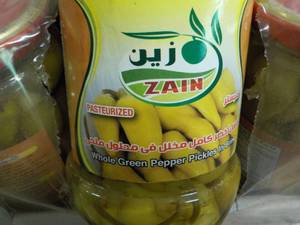 lot 244 image: 24 Jars Zain Whole Green Peppers...