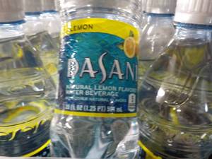 lot 253 image: 24 Bottles Dasani Lemon Flavored Wa...