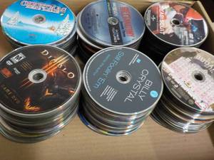lot 255 image: 300 or so CDs, DVDs, Games and Au...