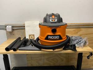 lot 4 image: RIGID 14 Gal. 6.0-Peak HP NXT WetDry Shop Vacuum with Fine Dust Filter, Dust Bag, Hose and 7 Accessories
