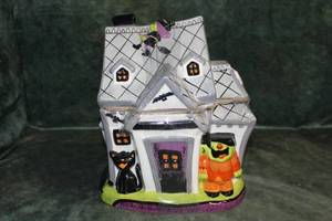 lot 75 image: Ceramic Haunted House Cookie Jar