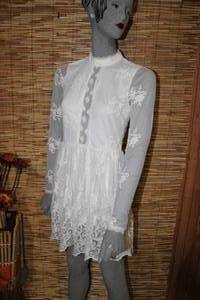 lot 64 image: Forever 21 Short & Sassy White Dress
