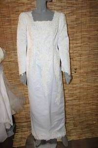 lot 12 image: Conservative White Embellished Wedding Dress