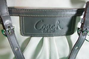 lot 44 image: Large White Leather Coach Purse